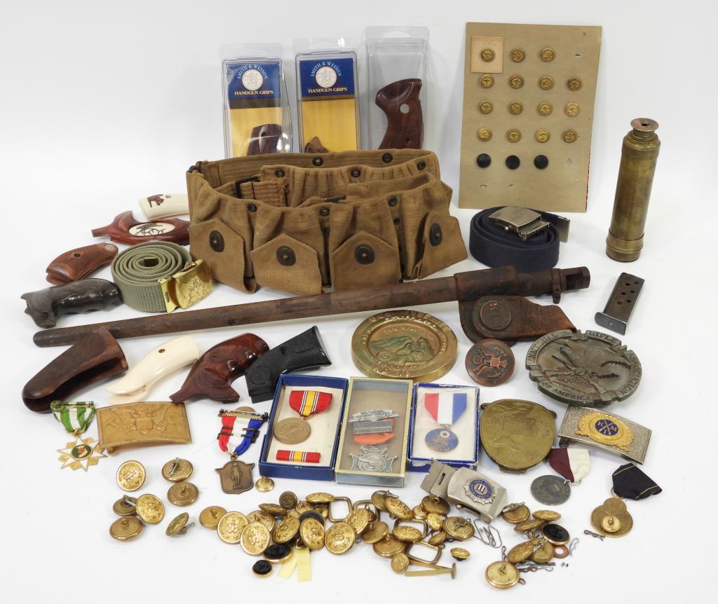 Lg Collection of Military & Other Items: United States,20th Century Includes a Rhode Island Militia bayonet, a ten pocket ammunition belt, ten handgun grips, military medals, buttons, two belts, a telescope, and belt buckles. Metal, textile,