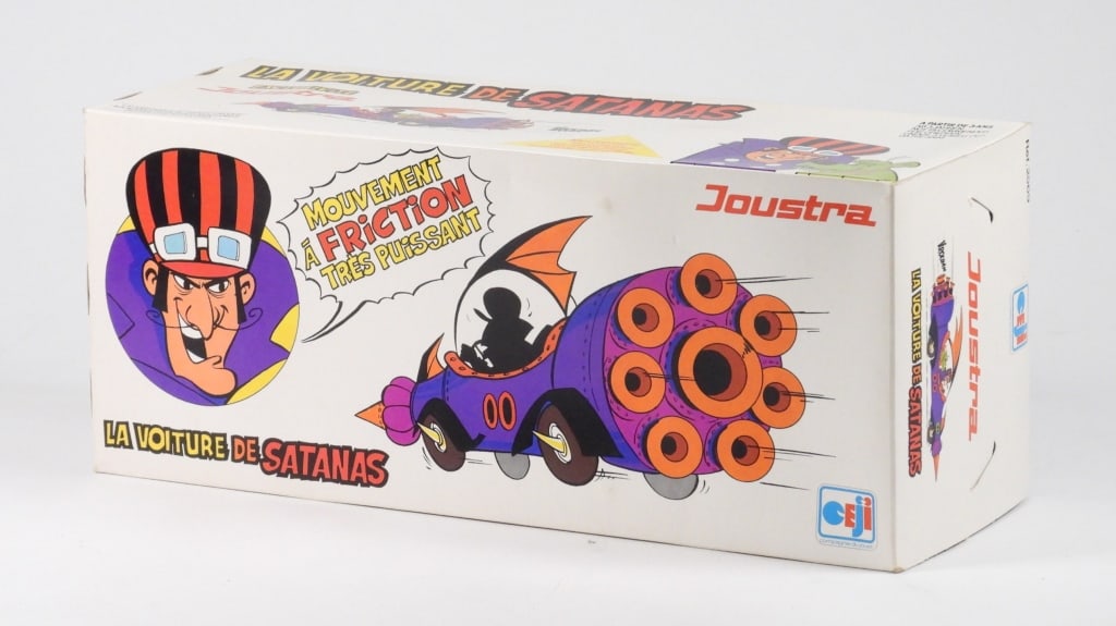 1975 French Ceji Joustra Wacky Races Mean Machine: France,1975 1975 French Ceji-Joustra Wacky Races Dick Dastardly's Mean Machine race car, Box C7.5+ with light to moderate wear as expected from age and storage, rippling to box with small puncture to