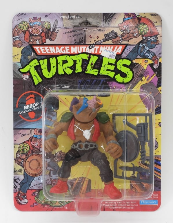 1988 Playmates TMNT Bebop Pink Soft Head MOSC: United States,1988 1988 Playmates Teenage Mutant Ninja Turtles Bebop, soft head variant with pink nose, C8 factory sealed with minimal wear as expected from age and storage, clear bubble with small de