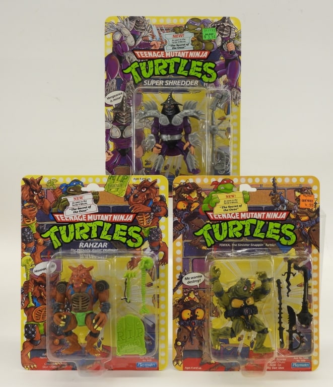 3PC 1991 Playmates TMNT Movie II MOSC Group: United States,1991 Group includes 1991 Playmates Teenage Mutant Ninja Turtles Movie II Rahzar, Super Shredder, and Tokka, all factory sealed with light to moderate wear as expected from age and storag