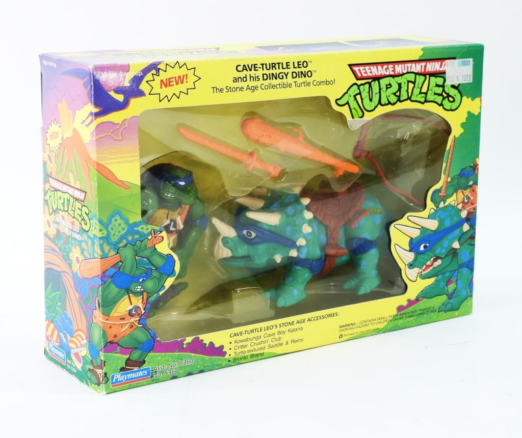 1993 Playmates Cave-Turtle Leo & Dingy Dino MIB: United States,1993 1993 Playmates Teenage Mutant Ninja Turtles Cave-Turtle Leo and his Dingy Dino, Toy C7.5+ with light wear including scuffing with paint loss to dinosaur horns, accessories factory s