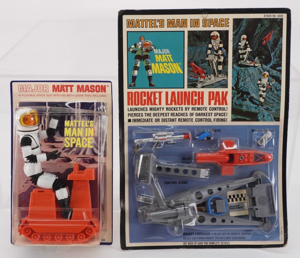 2PC 1966-67 Mattel Major Matt Mason MOSC Group: United States,1966-1967 Group includes 1966 Mattel Major Matt Mason Rocket Launch Pak and 1967 Major Matt Mason with Lunar Trac, both factory sealed with light to moderate wear as expected from age an