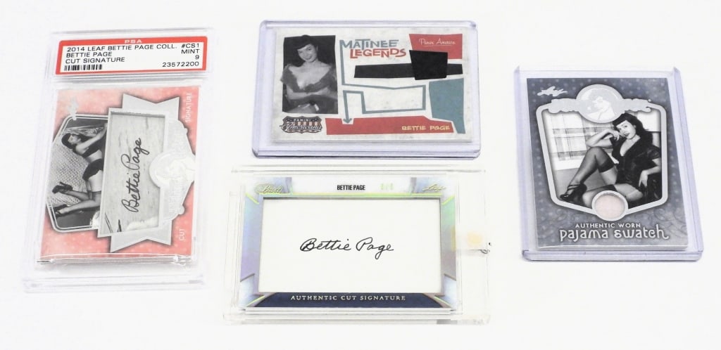 4PC Leaf Panini Bettie Page Auto Swatch Card Group: United States,20th Century Group includes 2011 Panini Matinee Legends Bettie Page swatch card 196/499, 2014 Leaf Bettie Page pajama swatch card, 2014 Leaf Bettie Page cut signature card PSA 9, and a 2