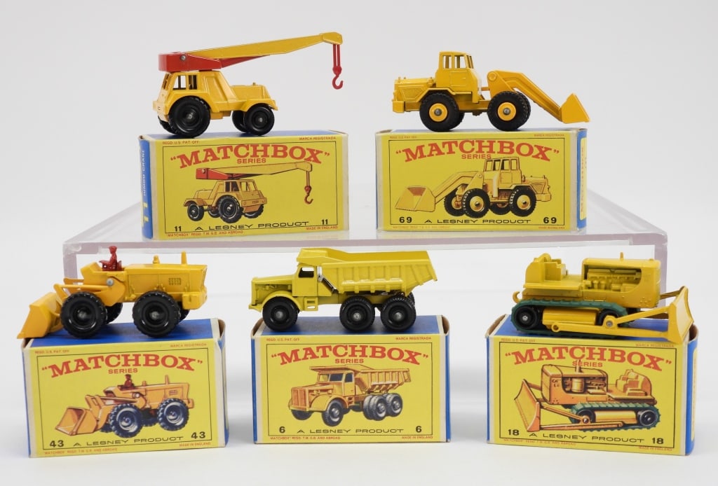 5PC Lesney Matchbox Diecast Construction Group: England,20th Century Group includes Lesney Matchbox #6 Euclid Quarry Truck, #11 Jumbo Crane, #18 Caterpillar Bulldozer, #43 Tractor Shovel, and #69 Hatra Tractor Shovel, all opened and in near mint co