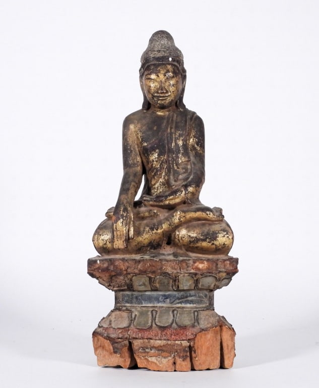 19C Burmese Carved Wood Buddha: Burma,19th Century Depicts Buddha seated on a double lotus base positioned in the Bhumisparsha Mudra. Wood From the collection of a North Scituate, Rhode Island estate. Approx. 14" t x 6" w x 4" d.
