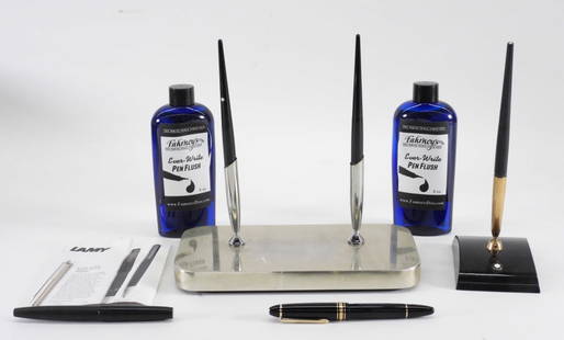 6PC Montblanc Fountain Pens: Germany,20th Century Includes two Montblanc black fountain pens in a William Sklaroff stand, a black fountain pen with 14K gold nib in a matching Montblanc stand, a black Montblanc Meisterstuck pen wi