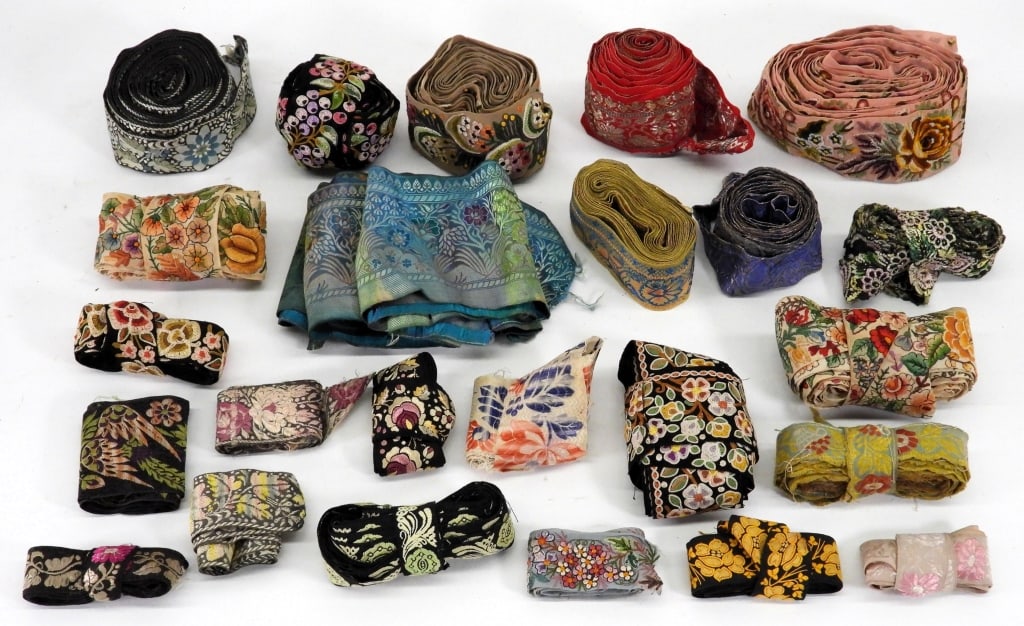 25PC Finest 18-20C. Chinese Embroidered Trim: China,18th- Early 20th Century Includes an array of robe/ scroll trims of varying colors and sizes utilizing forbidden stitch, metallic threads, and other techniques. An amazing lot of fabric for futu