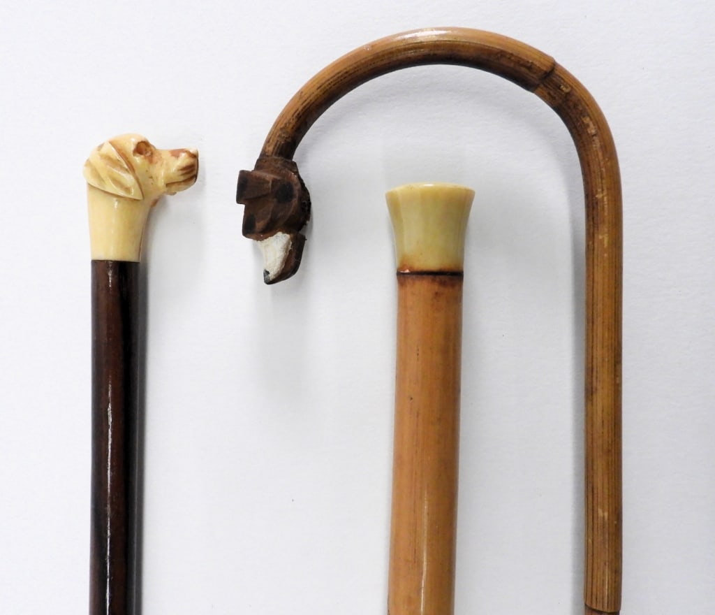 3PC Figural Dog Handled Cane Walkingstick: United States,Early 20th Century Includes a bamboo hook cane with figural dog head end, a bamboo and bone handled knob cane, and a carved bone figural dog head handled cane. Wood, bone From the collec