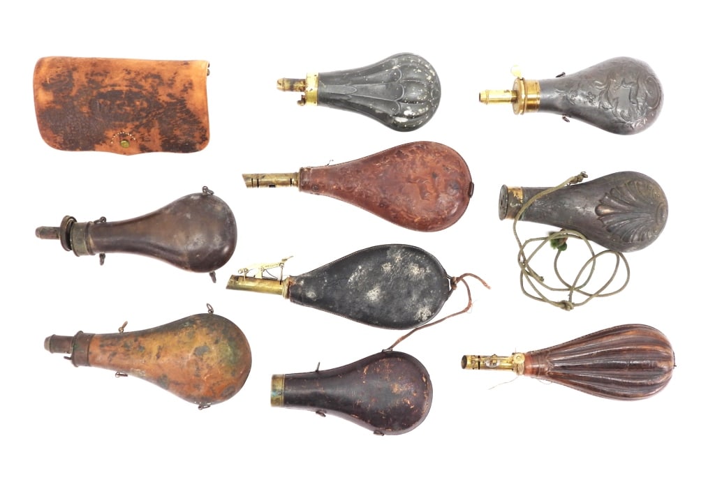 Group of Powder and Shot Flasks: , Nine powder and shot flasks; and a National Guard Pennsylvania .50-70 cartridge box marked "NGP" on the flap. .