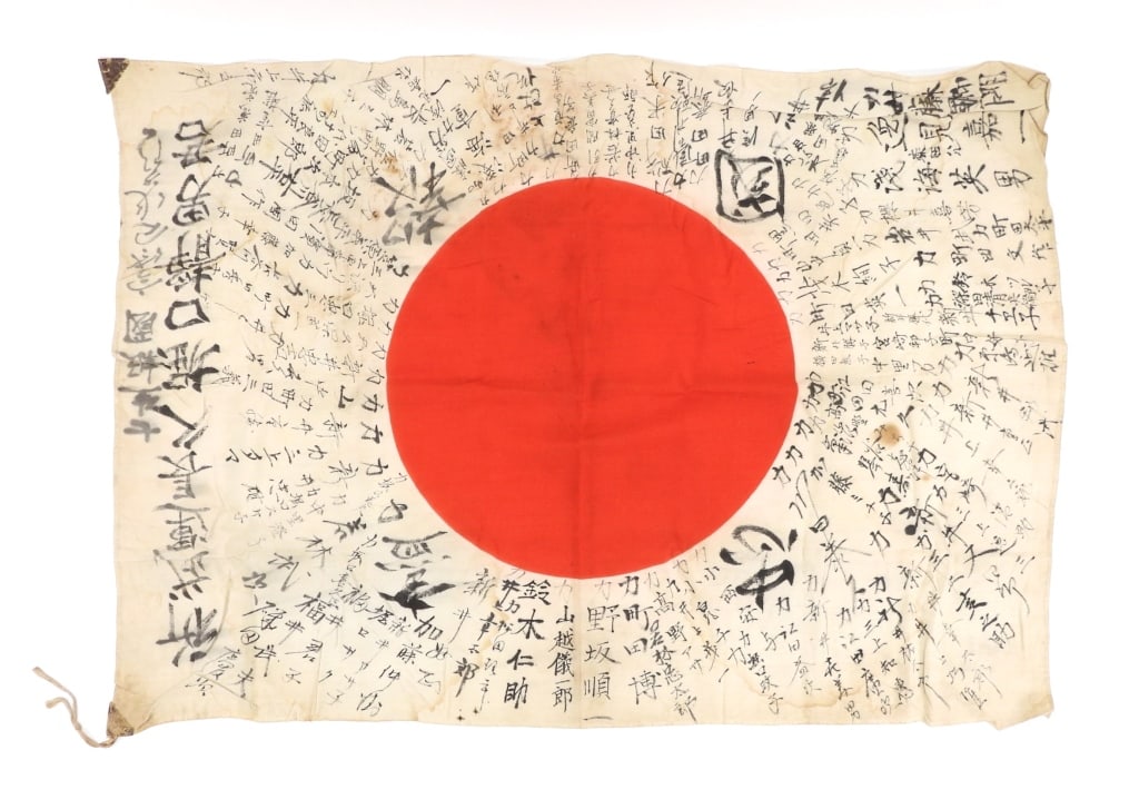 WWII Japanese Good Luck Flag: Japan, Silk flag with Japanese characters over the white background, with small reinforcements and ties on the hoist corners. Overall lg. 36".Overall ht. 26"
