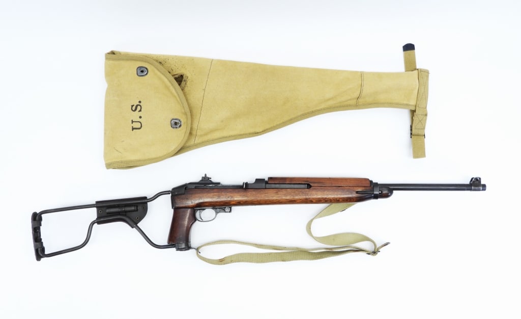 U.S. Inland M1A1 Paratrooper Carbine and Case: United States,C. 1943 .30 carbine caliber, serial number 616890, walnut stock with an ordnance wheel on the right side of the grip, parkerized finish, folding stock marked with light "B257614" and a s