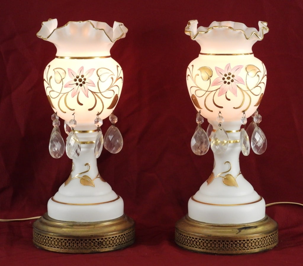 PR White Gilt Mantle Luster Lamps: Bohemia Late 19th- Early 20th Century Pair of ruffled rim opaque white matte glass lusters decorated with gilt leaves to body and column with drop cut crystals around the perimeter. Glass, brass,Appro