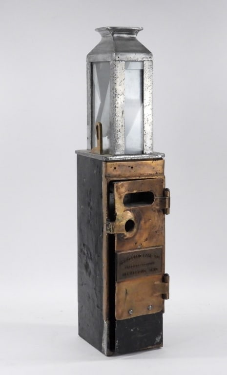 Antique Cleveland Bus Fare Token Box: Ohio Early 20th Century Open top over metal and glass box over large black and bronze colored case with single door opening to money catch. Metal, glass,Approx. 28 1/2" t x 6 1/2" w x 7 1/2" d. Marked