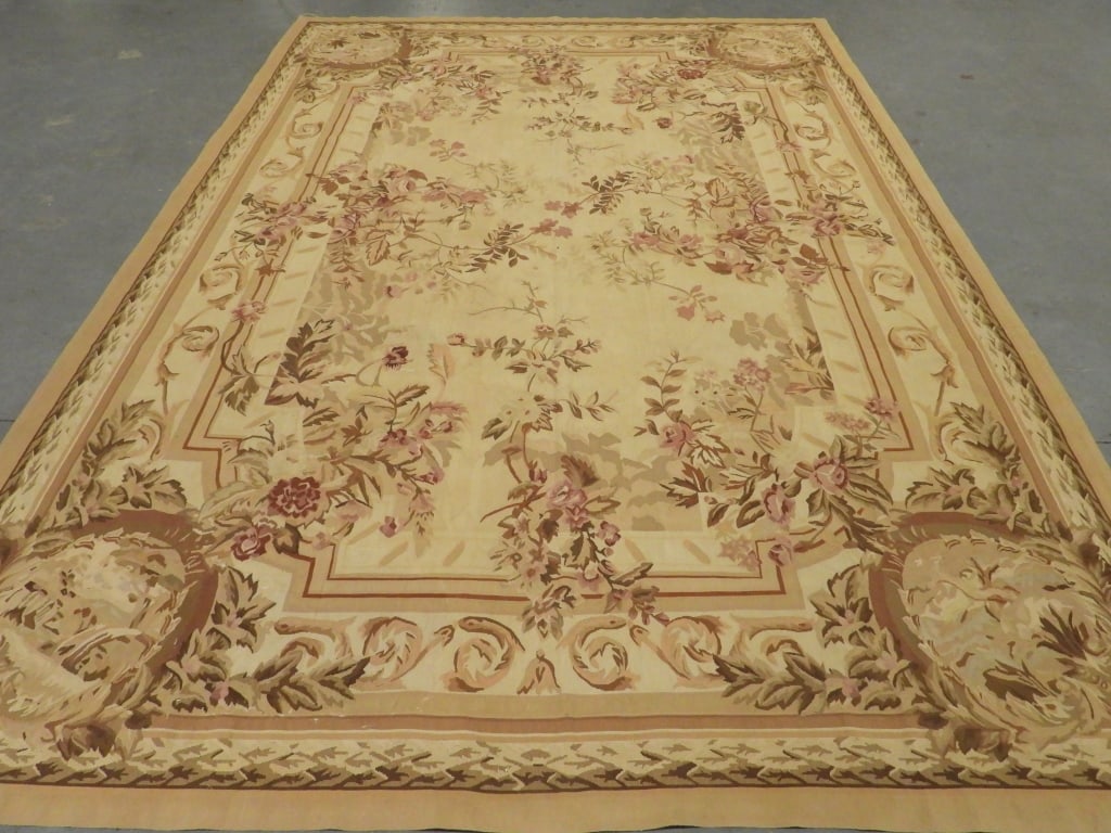 LG French Sino Aubusson Rug: France 20th Century Pink and tan pictorial flower pattern over ivory field surrounded by acanthus leaf borders. Opposite ends depict landscape scenes. Wool,Approx. 14' x 9'. From the collection of a S