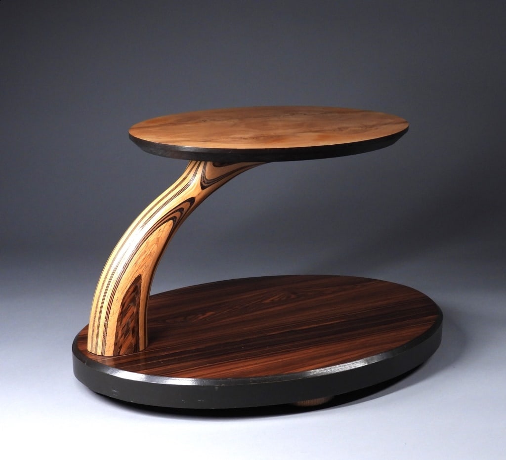 Henredon Scene Two Mixed Wood Coffee Table Stand: United States,20th Century Oval burl wood top over zebra wood column supported by oval shaped base. Henredon was established in 1945 by Henry Wilson, Ralph Edwards, Donnell VanOppen, and John Harris i