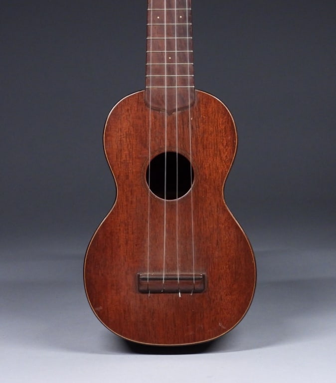 Oliver Ditson Soprano Ukulele: United States,Early 20th Century Soprano ukulele sold by the Oliver Ditson Company, one of the major American 19th Century music publishing houses. Established by Oliver Ditson and published Haydn's "