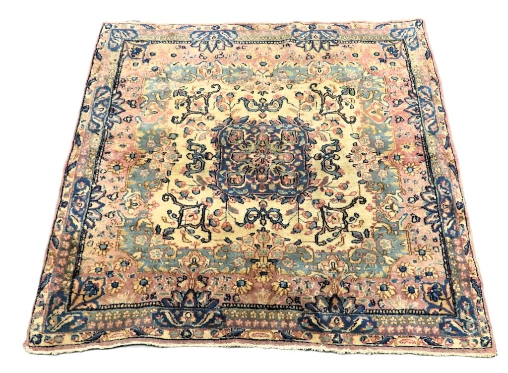 Square Botanical Kerman Rug: Middle East,20th Century Pastel blue, pink, navy blue, and tan botanical central medallion over ivy field surrounded by botanical cartouche boarders. Wool,Approx. 47" x 48". From the collection of a W