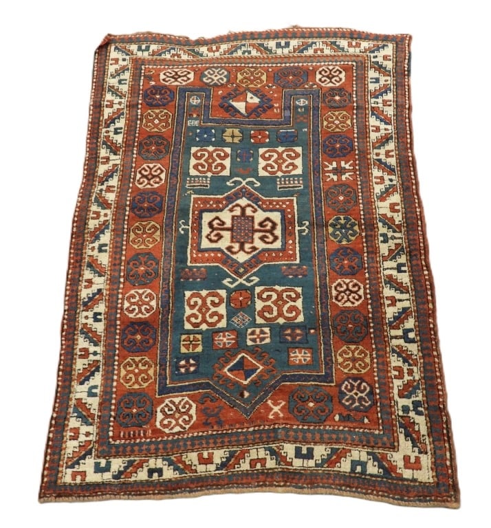 Fachralo Kazak Prayer Carpet Rug: Caucuses,19th Century Red, white, and blue geometric pattern over blue field surrounded by geometric boarders. Wool,Approx. 5' 7" x 3' 9". From the collection of a Chestnut Hill Estate.