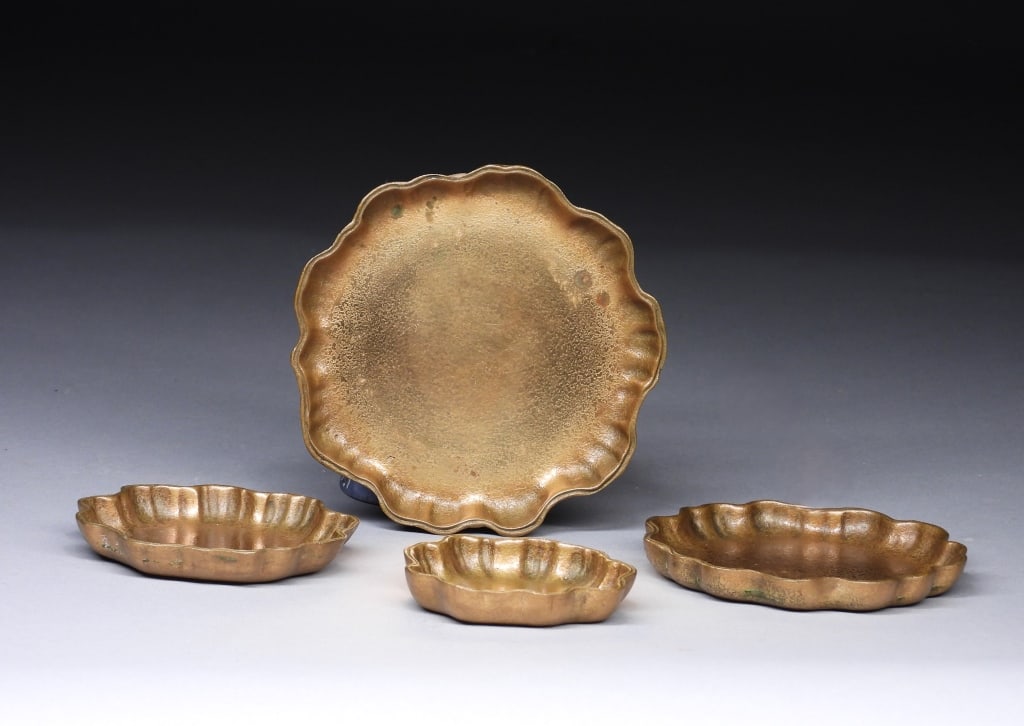 4PC Tiffany Studios Dore Bronze Nesting Trays: New York,Early 20th Century Four ruffled rim nesting trays stacked together to form a blooming flower. Tiffany & Co. was founded in 1837 by Charles Lewis Tiffany with the help of his father, selling a