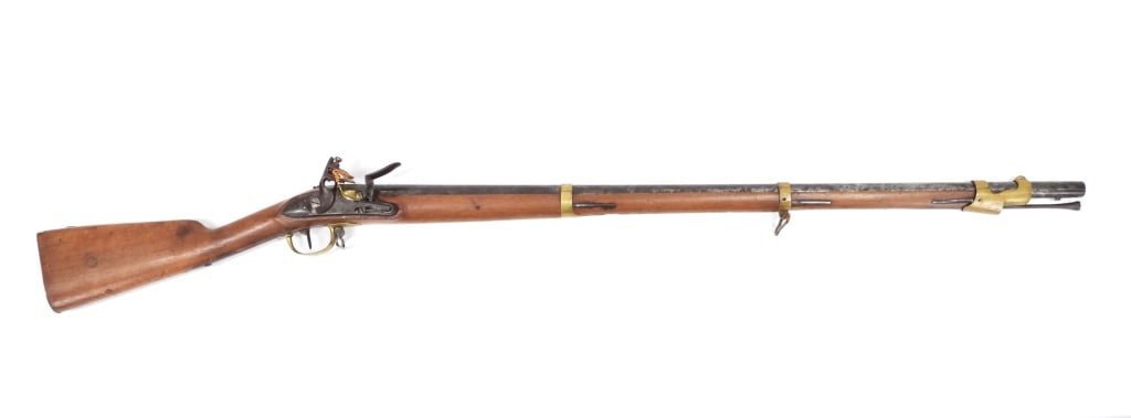 French or Belgian Flintlock Musket: France/Belgium C. early 19th century .70 bore, NSN, walnut stock with a cheek cutout on the left side of the butt, brass butt plate, brass trigger guard bow marked "MR", steel lower trigger guard tang