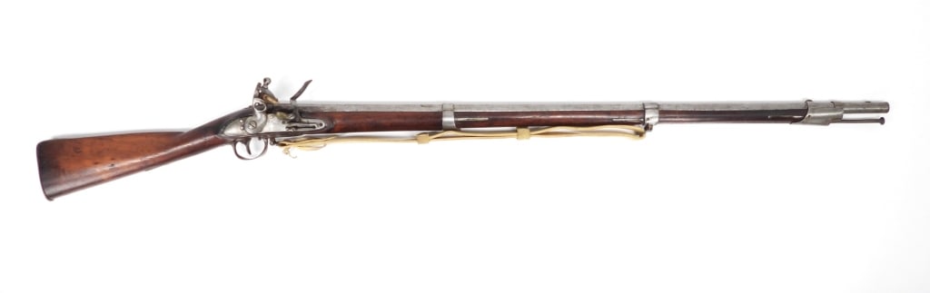 U.S. Model 1816-type Musket: United States C. early 19th century .72 bore, NSN, walnut stock with "DW" lightly carved into the left side of the butt, steel fittings, butt plate tang dated "181" with the last number obscured, no v
