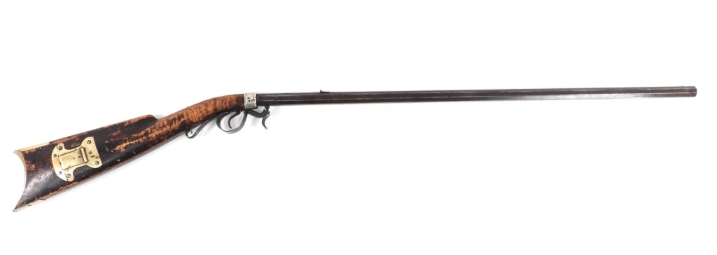 Underhammer Percussion Rifle: United States C. 1830 .36 caliber, NSN, figured maple stock, brass butt plate and patch box, German silver triangular escutcheon plate and nose cap, octagonal barrel with a German silver front sight.