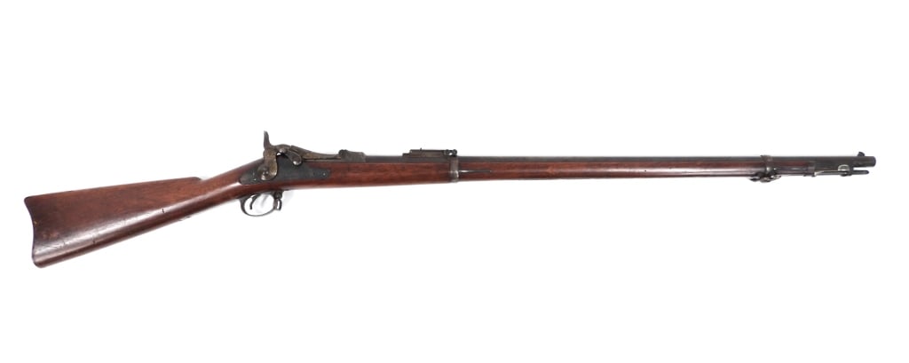 U.S. Model 1884 Trapdoor Springfield Rifle: United States C. 1891 .45-70 caliber, serial number 315813, walnut stock with a crisp cartouche on the left side, lock marked with an eagle and "U.S./SPRINGFIELD", breech block marked "U.S/MODEL/1884"