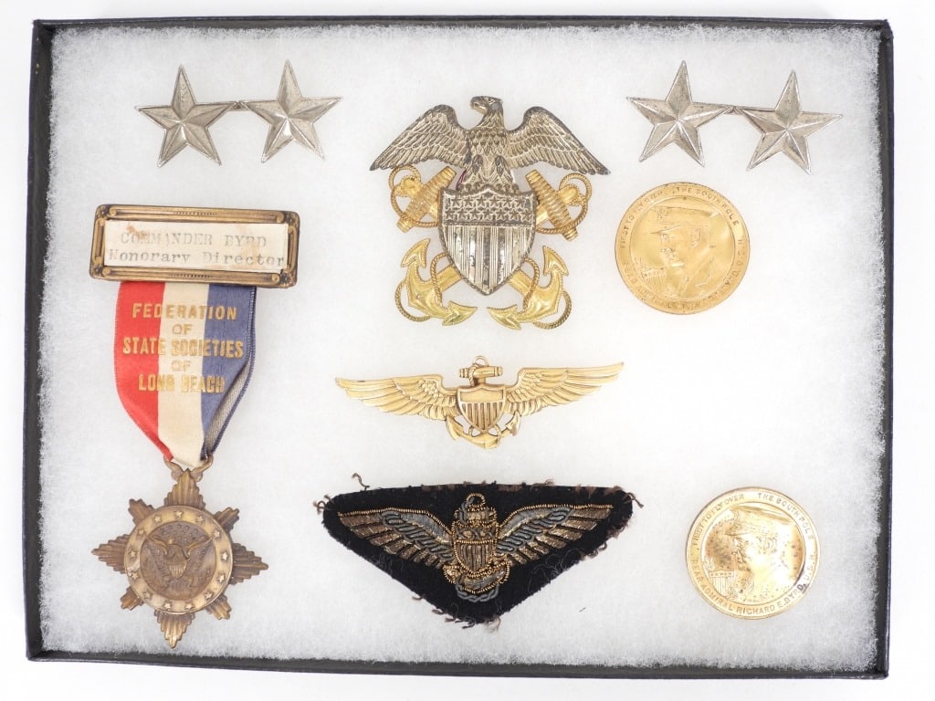 Group of Insignia From Admiral Richard Byrd: United States Two sterling silver two star Rear Admiral insignia, a Federation of State Societies medal marked "COMMANDER BYRD/Honorary Director", a screw back U.S. navy cap insignia, two South Pole m