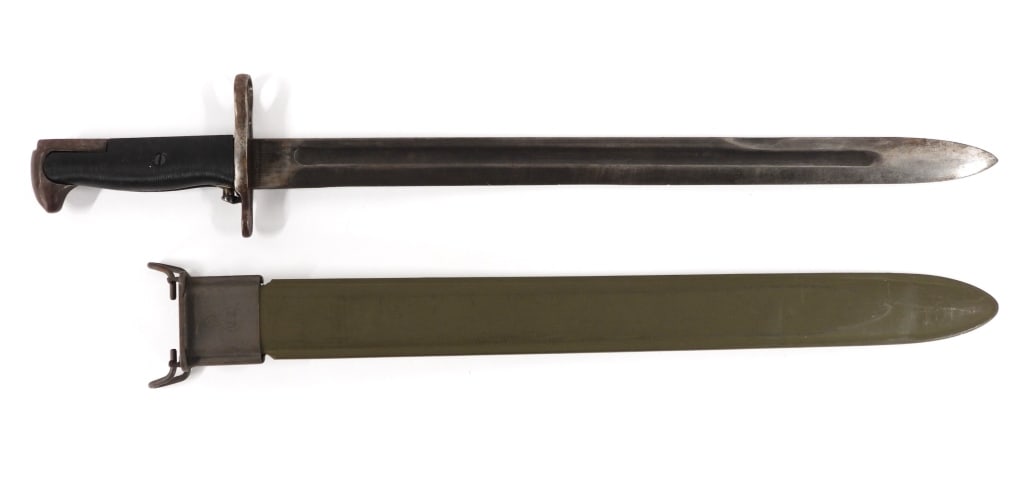 U.S. Model 1905/42 Oneida Limited Bayonet: United States C. 1943 Parkerized steel hilt, black Bakelite grips, marked on one side of the ricasso "OL/US/1943" with an ordnance bomb, with a small ordnance stamp on the other side of the ricasso, p