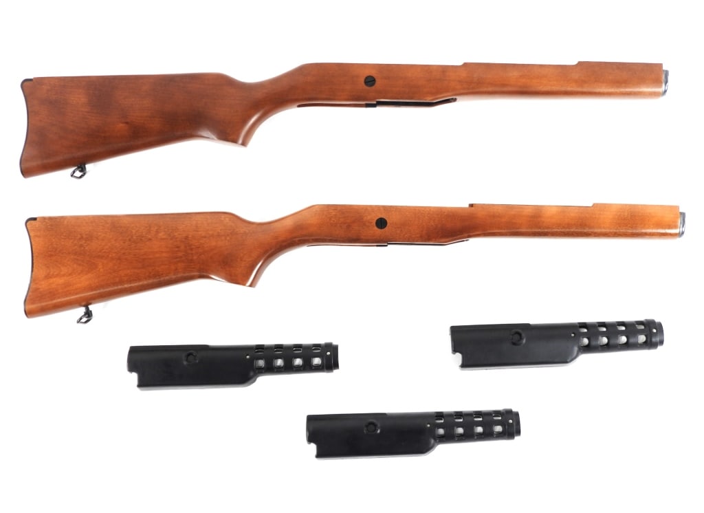 Ruger Mini-14 Stocks and Hand Guards: United States Two walnut Ruger Mini-14 stocks; and three composite hand guards.