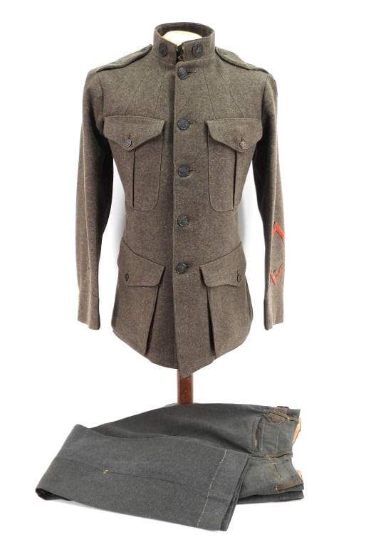 WWI 5th Marine Brigade Tunic and Trousers: United States C. 1917-18 Forest green twill woven tunic with Marine Corps buttons, two eagle, globe, and anchor screw back collar tabs, a purple 5th Marine Brigade patch on the left shoulder, a servic