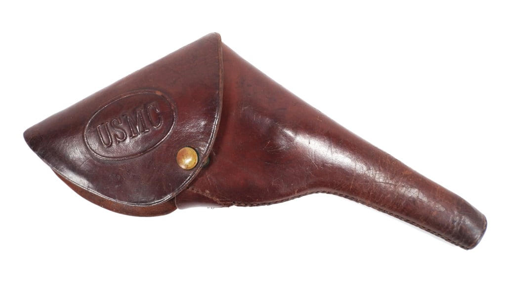 U.S. Marine Corps .38 Colt 1905 Revolver Holster: United States C. early 20th century Russet brown leather holster marked "USMC" in an oval, with a brass snap on the flap, and a wide belt loop riveted to the back. Overall lg. 14".