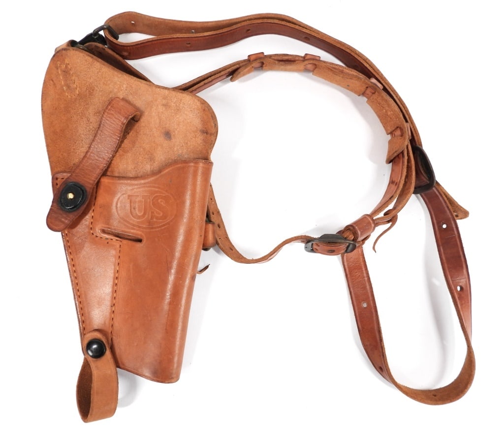 USMC Boyt-marked M7 Shoulder Holster: United States C. 1945 Russet brown leather M7 shoulder holster marked "US" on the front, and "USMC/BOYT/45" on the upper back.