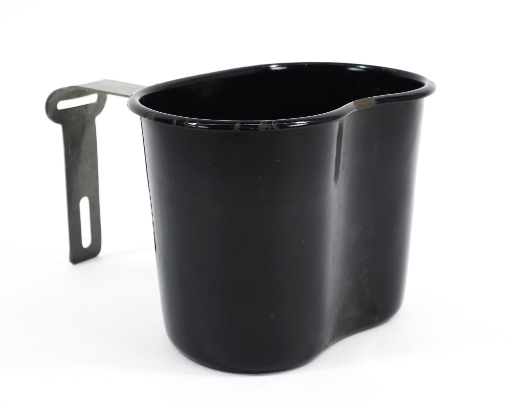 USMC L.F. & C. Blue Enameled Canteen Cup: United States C. 1942 Blue porcelain canteen cup, with an aluminum handle marked "U.S./L.F. & C./1942". Overall ht. 4".Overall wd. 5 3/8"