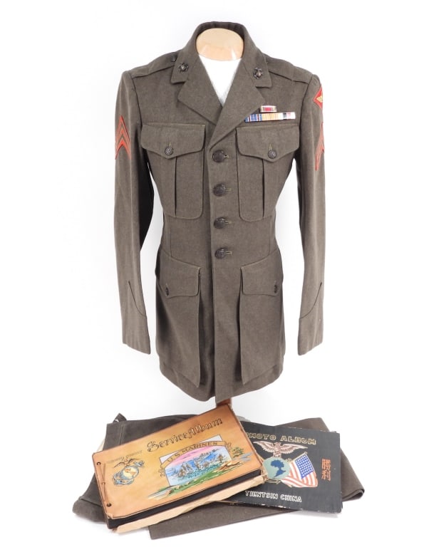USMC Uniform and Photos of Carl J. Strobl: United States C. 1942-43 Forest green tunic with eagle, globe, and anchor insignia on the collar, ribbon bars above the left breast pocket, 1st Marine Air Wing patch on the left shoulder, corporal str