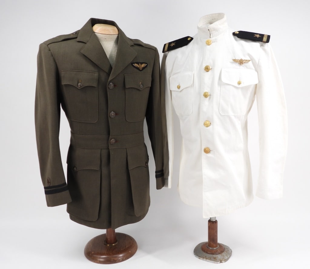 Tunics of Navy Flight Instructor F.B. Markey: United States Green twilled wool tunic with Navy buttons, embroidered pilots wings sewn above the left breast pocket, rank insignia sewn to the sleeves; and a dress white tunic with brass navy buttons