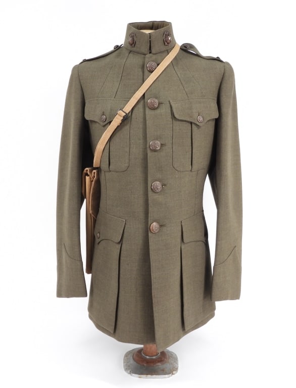 WWI USMC Tunic and Map Case of Theodore Cartwright: United States Forest green twilled wool tunic, brown-painted copper/brass buttons, eagle, globe, and anchor insignia on the collar, 2nd lieutenant's bars on each epaulet, and a map case marked "THC".