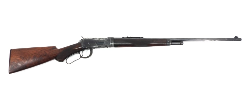 Winchester Model 55 Lever-action Rifle: United States .30 WCF caliber, serial number 882006,walnut stock with a checkered wrist and forend, blued finish, and marked on the left side of the barrel "-MODEL 55- WINCHESTER-NICKEL STEEL-30 W.C.F