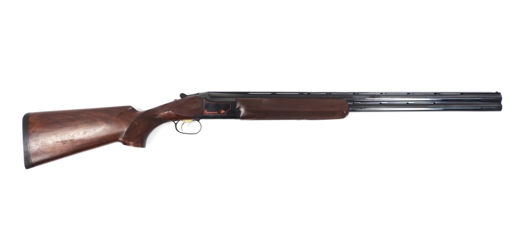 Browning Citori Gti O/U Shotgun: Japan 12 gauge, serial number 55753, walnut stock with a checkered wrist and forend, blued finish, marked on the right side of the receiver "BROWNING Gti", marked on the left side of the receiver "Gti