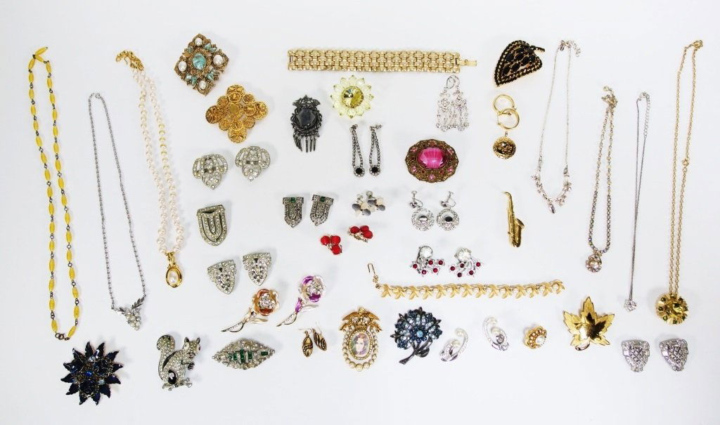 Weiss Sarah Coventry Monet Jewelry Grouping: 20TH CENTURY An estate grouping including early rhinestones and designers such as Weiss, Sarah Coventry, Mazer, Florenza and Monet. The lot includes six necklaces, two bracelets, fifteen brooches, fiv