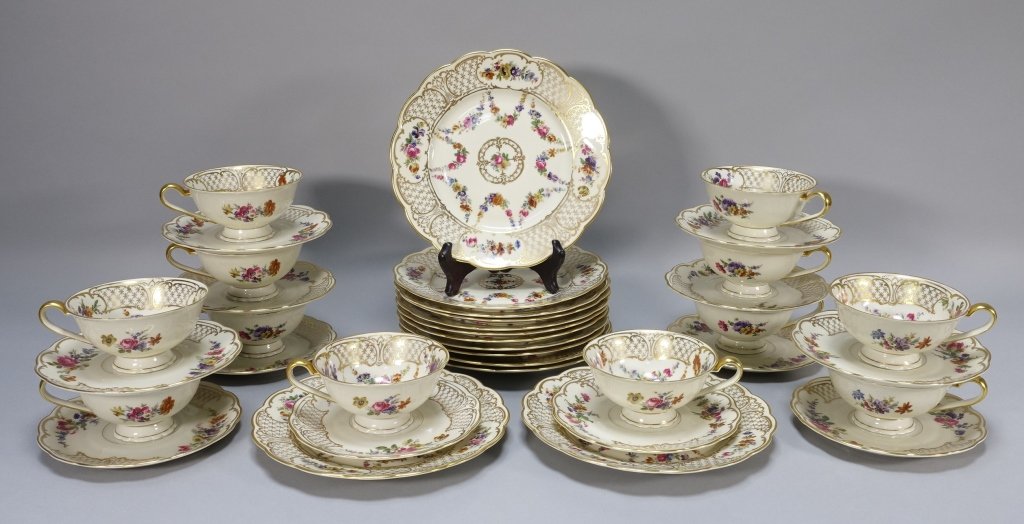 Royal Bayreuth Marie Antoinette Dessert Set: GERMANY, EARLY 20TH CENTURY A dessert set consisting of a 12 place settings including cup, saucer and dessert plate with fine design throughout. Dessert plates measure 8" diameter. Saucer measure 6" d