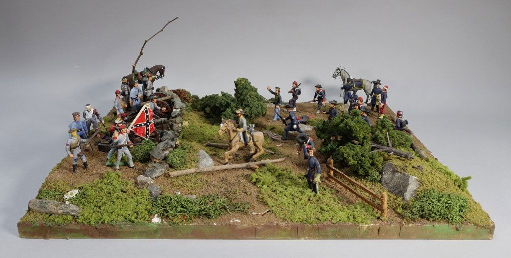 Civil War Diorama with Lead Soldier Battlefield: UNITED STATES, 20TH CENTURY The diorama depicting a Civil War battle between the Union and Confederate army. The painted lead soldiers are glued to landscape wooden board along with battlefield gear,