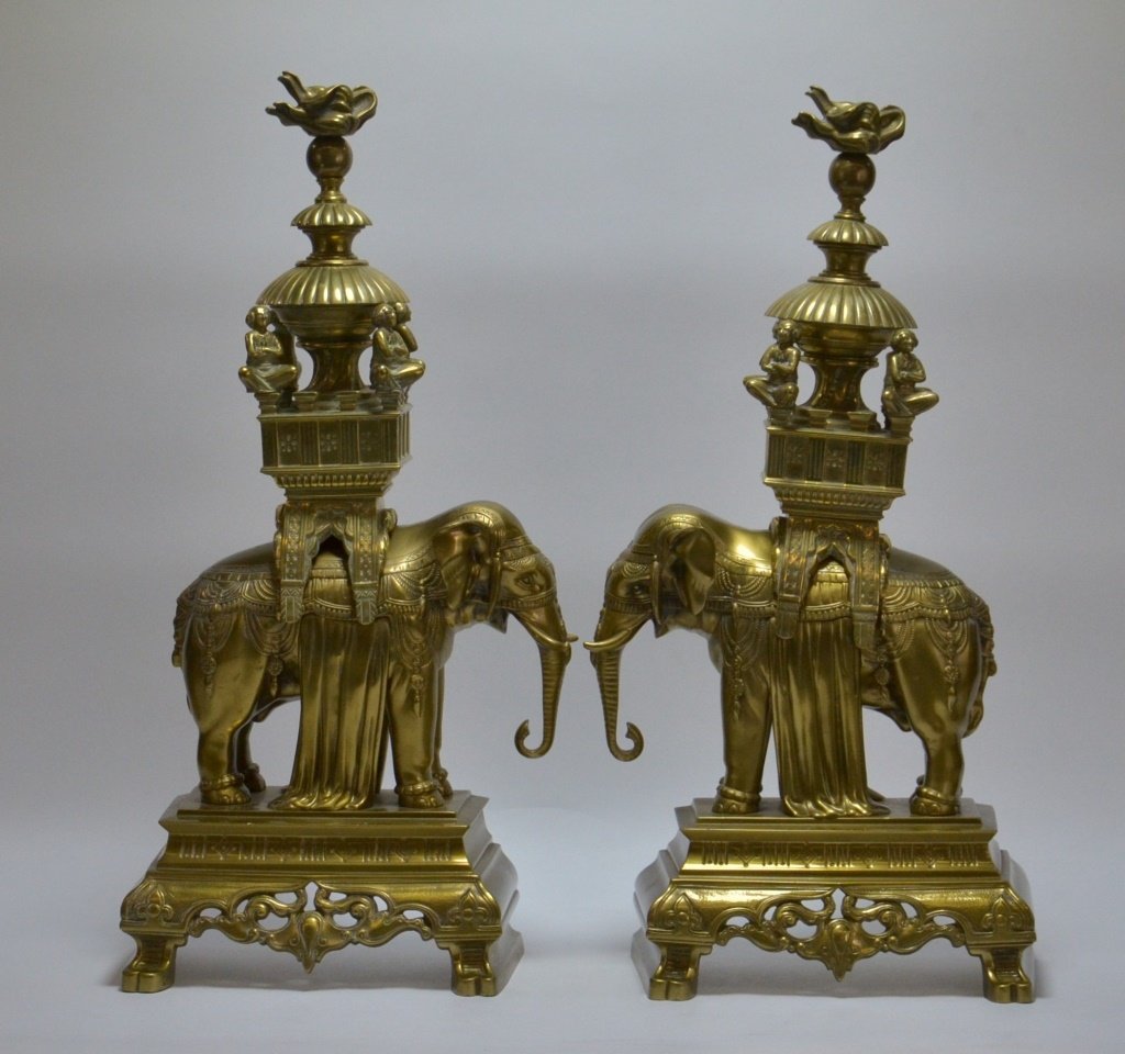 PR. Asian Indian Solid Brass Elephant Andirons: ASIA, MID 20TH CENTURY A fine quality pair of Asian Indian solid brass elephant andirons. The andirons were finally cast depicting elephants and their riders. The top section is removable. Truly a fin