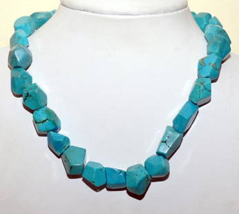 Sterling turquoise necklace nugget: Sterling nuggets polished drilled and strung to make a unique and beautiful necklace. -well polished stones in very nice dark turquoise with asymmetrical shape - matched well -about 24 stones size fro