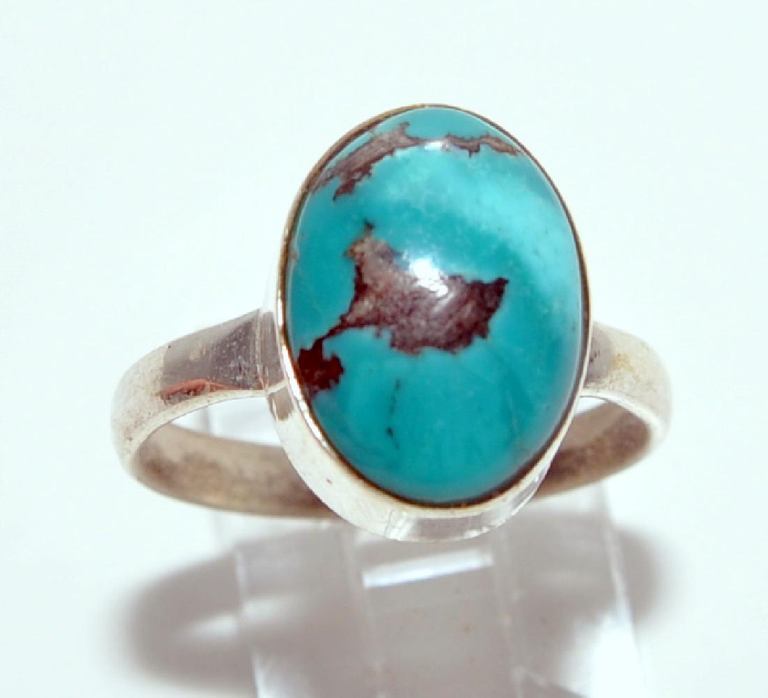 Ring sterling turquoise cabochon: Turquoise/howlite sterling cabochon ring with good color and style -about size 6 1/2 inches