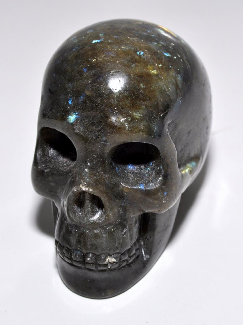 Skull labradorite carved detailed: Large skull labradorite hand carved and in fine detail - about 2 1/2 inches diameter - color on labradorite is very nice.