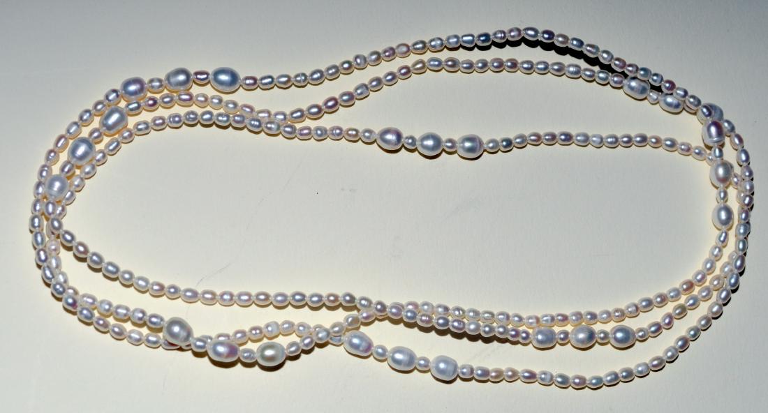Long pearl necklace baroque: Unusual long pearl necklace with multi shape natural pearls - nice lustre and condition -about 72 inches long