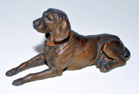 Hubley cocker spaniel paperweight: Hubley cast iron cocker spaniel paperweight - dog paperweight in excellent condition - dog is laying down and is about 5.5 x 3 x 2.5 inches
