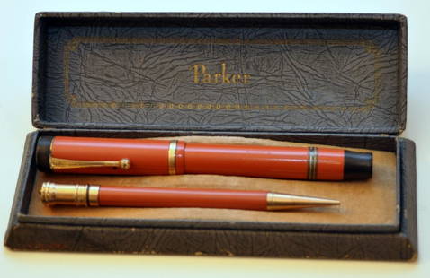 Parker Duofold red pen/pencil set vintage: Parker pen and pencil set in original box marked 9-15 on brass clip, nib marked Parker Duofold pen, also marked George S. Parker , Janesville, WI , Lucky Curve Duofold fountain pen, pen patent 4-25-11