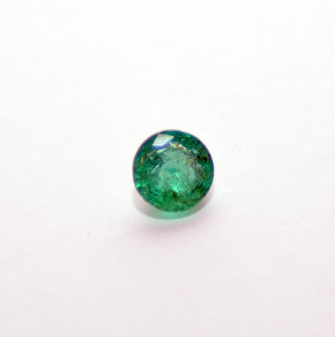 Emerald gemstone round faceted stone (1 of 4)